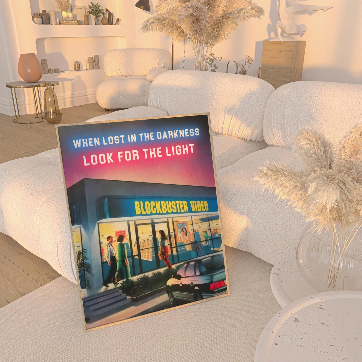 Look for the Light poster propped on a cream boucle sofa in a warm living room